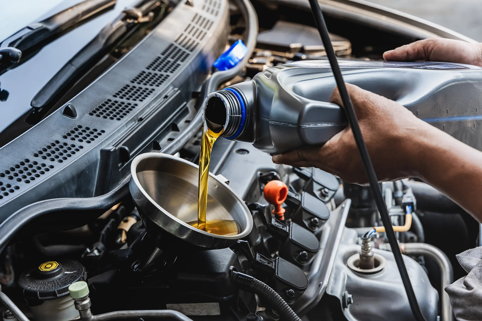Service technician installing truck parts