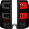 Dual C-Bar LED tail lights black housing smoked lens Sierra 2500HD